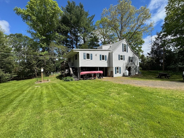 17 Green Rd, Vernon, CT 06066 - view of front of home featuring stairway and a front yard