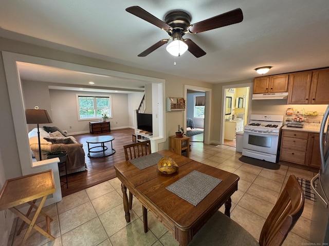 17 Green Rd, Vernon, CT 06066 - dining space featuring light tile patterned flooring, a ceiling fan, and baseboards