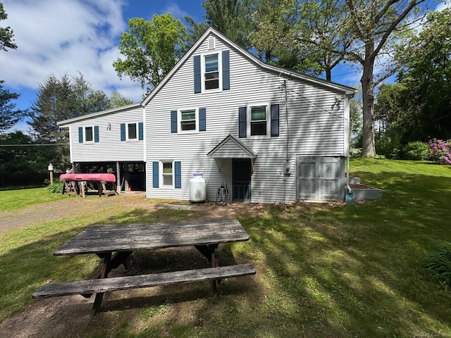 17 Green Rd, Vernon, CT 06066 - back of property with a yard and a wooden deck