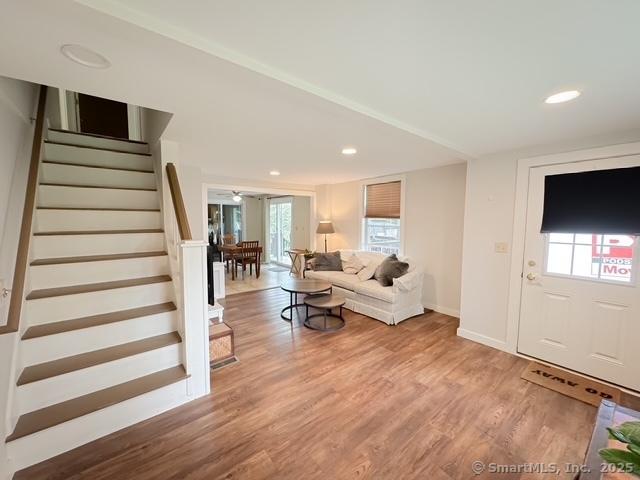 17 Green Rd, Vernon, CT 06066 - living room featuring stairway, light wood finished floors, baseboards, and recessed lighting