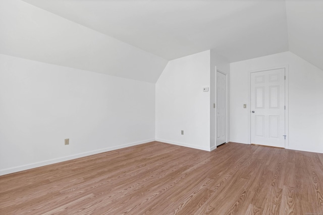 16 Copper Hill Dr Unit 16, Guilford, CT 06437 - additional living space featuring baseboards, light wood finished floors, and lofted ceiling