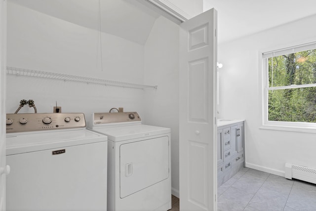 16 Copper Hill Dr Unit 16, Guilford, CT 06437 - laundry room featuring separate washer and dryer, baseboards, laundry area, and a baseboard heating unit