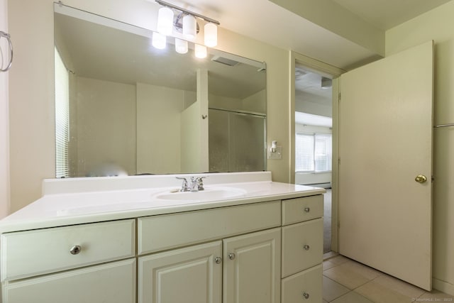 bathroom featuring vanity and tile patterned floors