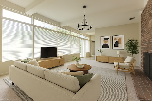 living area featuring baseboards, visible vents, beam ceiling, and a fireplace