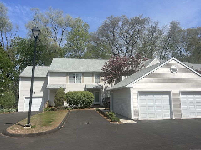 3409 Whitney Ave Apt 24, Hamden, CT 06518 - view of front of house with a garage