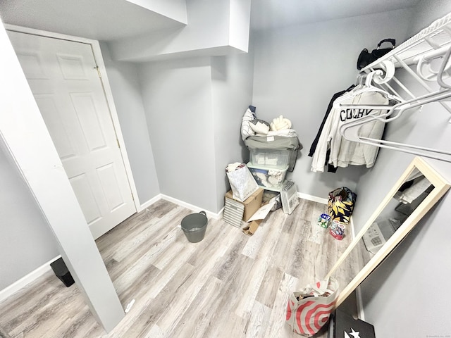 3409 Whitney Ave Apt 24, Hamden, CT 06518 - walk in closet with wood finished floors