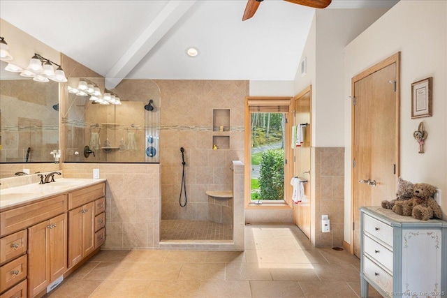 full bath with visible vents, tile patterned flooring, vanity, tile walls, and walk in shower