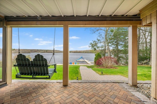 view of patio / terrace featuring a water view