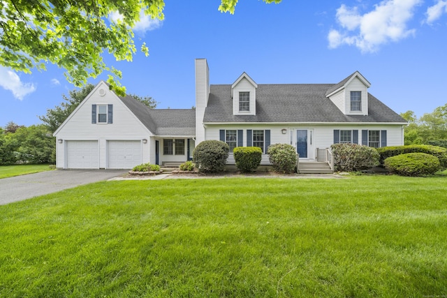 3 Eastwood Dr, Granby, CT 06060 - new england style home with a chimney, a front lawn, asphalt driveway, and a garage