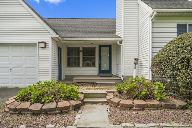 3 Eastwood Dr, Granby, CT 06060 - property entrance featuring a shingled roof, a porch, an attached garage, and a chimney