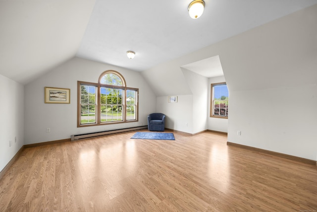 3 Eastwood Dr, Granby, CT 06060 - bonus room with a baseboard radiator, plenty of natural light, wood finished floors, lofted ceiling, and baseboards