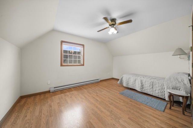 3 Eastwood Dr, Granby, CT 06060 - bedroom with baseboard heating, lofted ceiling, wood finished floors, a ceiling fan, and baseboards