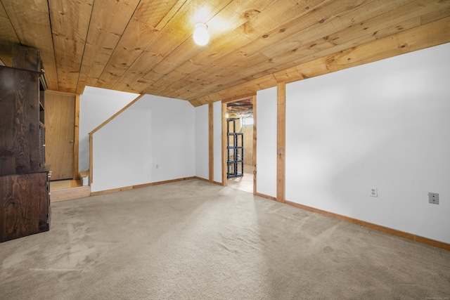 3 Eastwood Dr, Granby, CT 06060 - finished below grade area featuring wood ceiling, carpet flooring, baseboards, and stairway