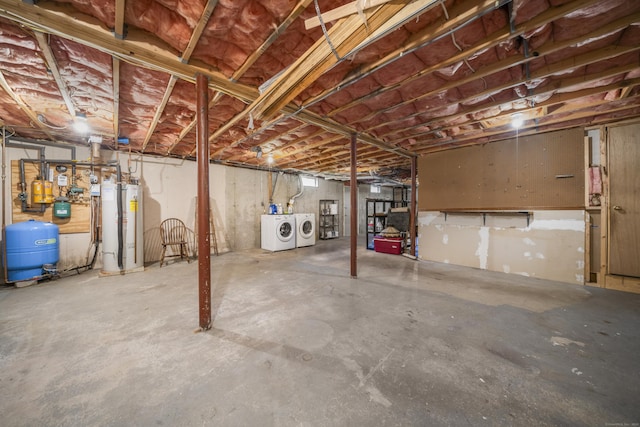 3 Eastwood Dr, Granby, CT 06060 - unfinished below grade area featuring water heater, washer and dryer, and a water pressure tank