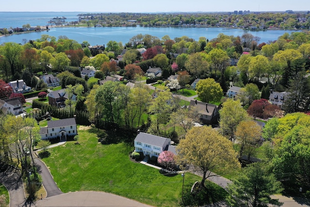 bird's eye view featuring a residential view and a water view