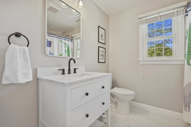 full bath with visible vents, vanity, marble finish floor, toilet, and baseboards