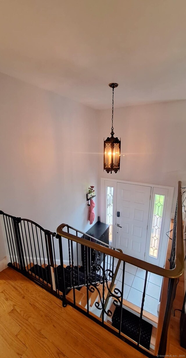 283 Hillcrest Ave, Newington, CT 06111 - entrance foyer featuring wood finished floors and a chandelier