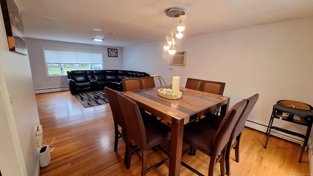 283 Hillcrest Ave, Newington, CT 06111 - dining space featuring baseboard heating, light wood finished floors, and a wall mounted AC