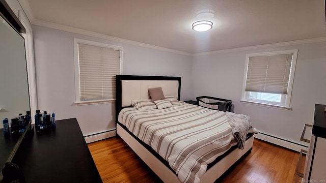 283 Hillcrest Ave, Newington, CT 06111 - bedroom featuring baseboard heating, ornamental molding, and wood finished floors