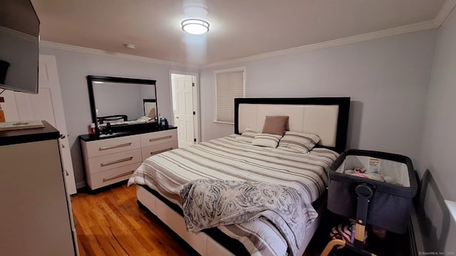 283 Hillcrest Ave, Newington, CT 06111 - bedroom featuring light wood-type flooring, ornamental molding, and baseboards