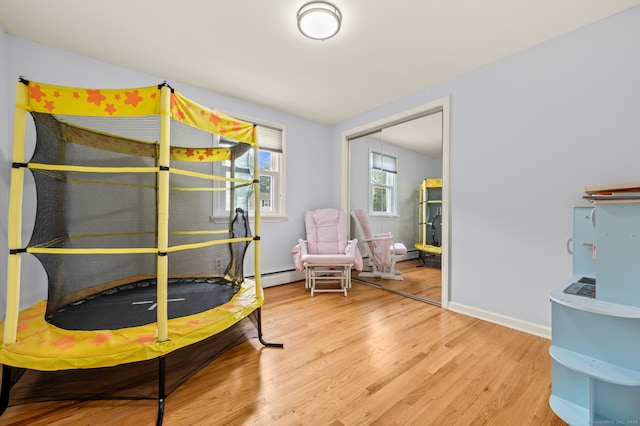 283 Hillcrest Ave, Newington, CT 06111 - bedroom with wood finished floors, a closet, and baseboards