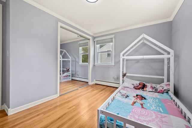 283 Hillcrest Ave, Newington, CT 06111 - bedroom featuring a baseboard radiator, ornamental molding, wood finished floors, and baseboards