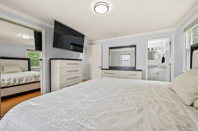 283 Hillcrest Ave, Newington, CT 06111 - bedroom featuring ornamental molding, wood finished floors, and ensuite bathroom