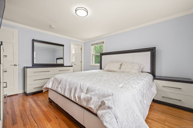 283 Hillcrest Ave, Newington, CT 06111 - bedroom with light wood finished floors and crown molding