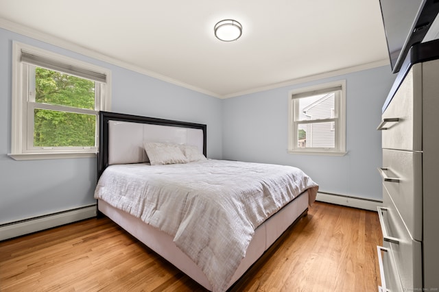 283 Hillcrest Ave, Newington, CT 06111 - bedroom with a baseboard heating unit, ornamental molding, and light wood-style floors