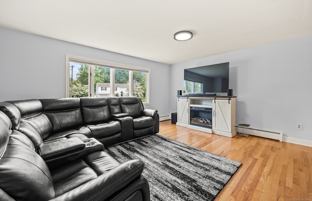 283 Hillcrest Ave, Newington, CT 06111 - living room with baseboard heating, light wood-style flooring, and baseboards
