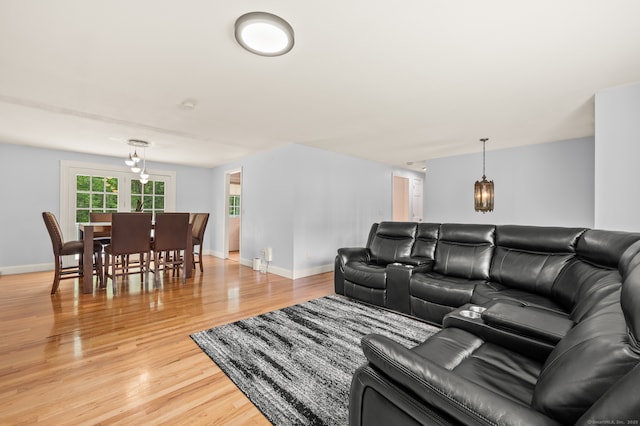 283 Hillcrest Ave, Newington, CT 06111 - living area with light wood-style flooring and baseboards