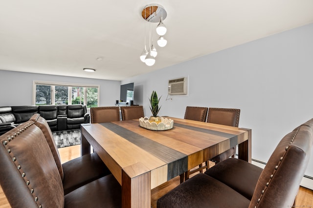 283 Hillcrest Ave, Newington, CT 06111 - dining room with a wall mounted AC, light wood-style flooring, and a baseboard heating unit