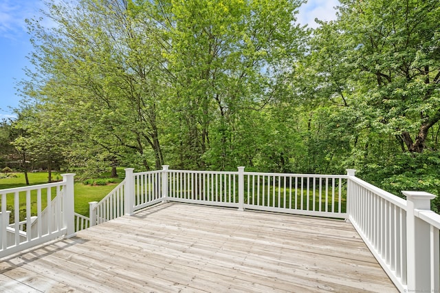 283 Hillcrest Ave, Newington, CT 06111 - wooden deck featuring a lawn