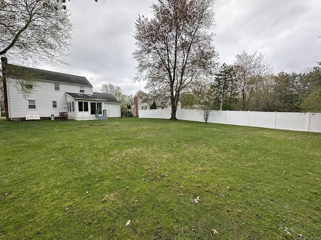 view of yard with fence