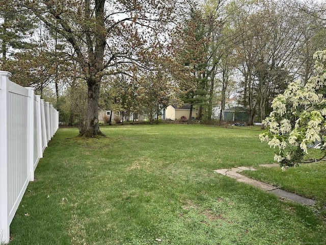 view of yard with fence