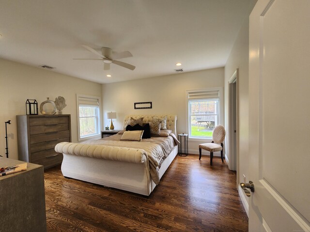 bedroom with recessed lighting, ceiling fan, visible vents, and dark wood-style floors