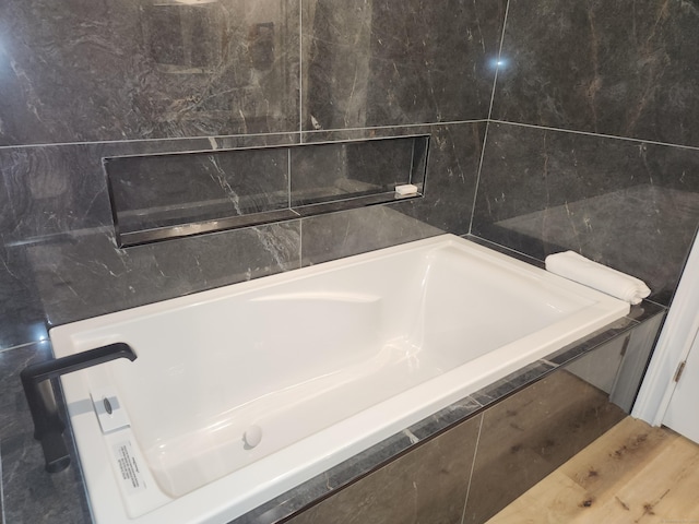 full bathroom with a bathing tub