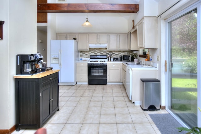 kitchen featuring light tile patterned flooring, a sink, white appliances, light countertops, and under cabinet range hood