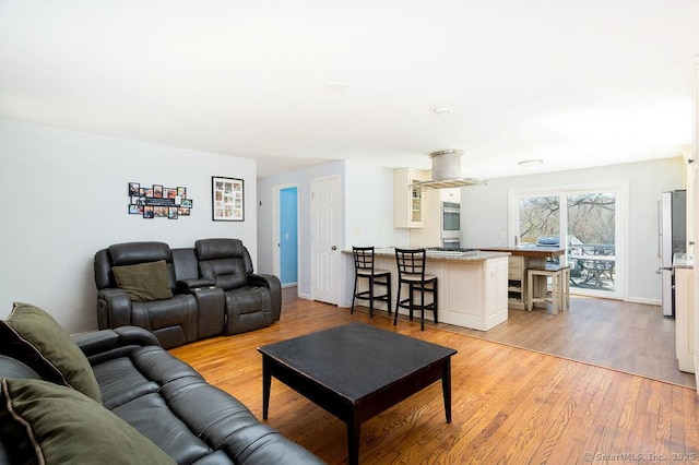 38 Black Bridge Rd, Newtown, CT 06482 - living area with baseboards and light wood finished floors