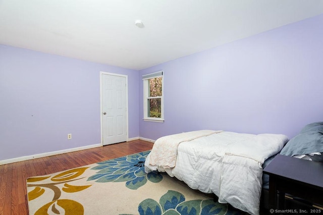 38 Black Bridge Rd, Newtown, CT 06482 - bedroom with baseboards and wood finished floors
