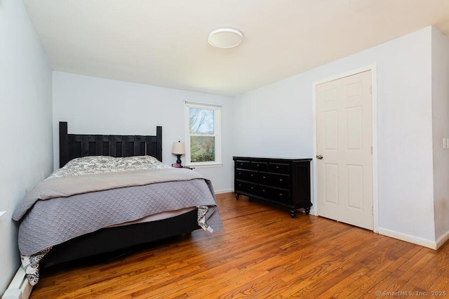 38 Black Bridge Rd, Newtown, CT 06482 - bedroom with baseboards and wood finished floors