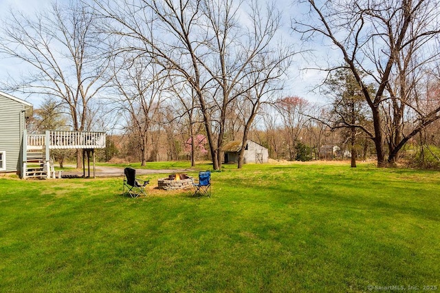 38 Black Bridge Rd, Newtown, CT 06482 - view of yard with a deck, a fire pit, an outdoor structure, and stairs