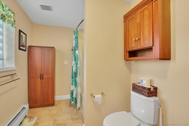bathroom featuring a baseboard heating unit, toilet, baseboards, visible vents, and shower / bath combination with curtain