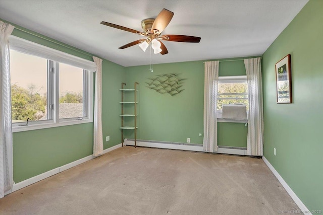 unfurnished room featuring ceiling fan, carpet flooring, and baseboards