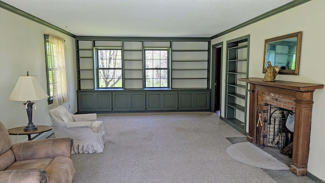 32 Great Hill Pond Rd, Portland, CT 06480 - carpeted living room featuring built in shelves, ornamental molding, a brick fireplace, and a textured ceiling