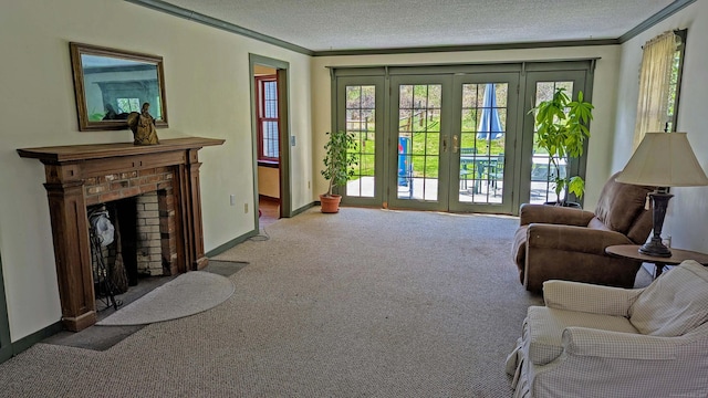 32 Great Hill Pond Rd, Portland, CT 06480 - living area with carpet floors, crown molding, a healthy amount of sunlight, and a brick fireplace