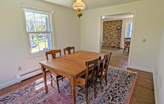 32 Great Hill Pond Rd, Portland, CT 06480 - dining space featuring baseboards, baseboard heating, and wood finished floors