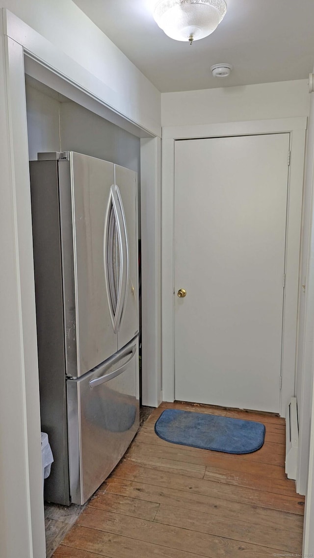 32 Great Hill Pond Rd, Portland, CT 06480 - laundry room featuring wood finished floors and a baseboard radiator