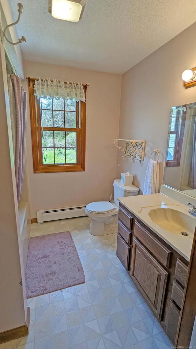 32 Great Hill Pond Rd, Portland, CT 06480 - full bath featuring vanity, a baseboard radiator, a textured ceiling, and toilet