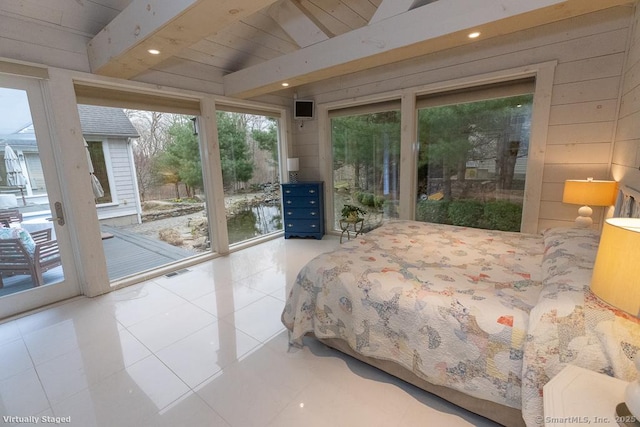 tiled bedroom featuring recessed lighting, wood walls, access to exterior, and visible vents